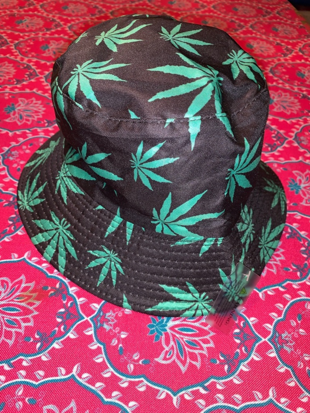 NWT Bucket Hat, One Sz.  Black with Green Pot Leaves.